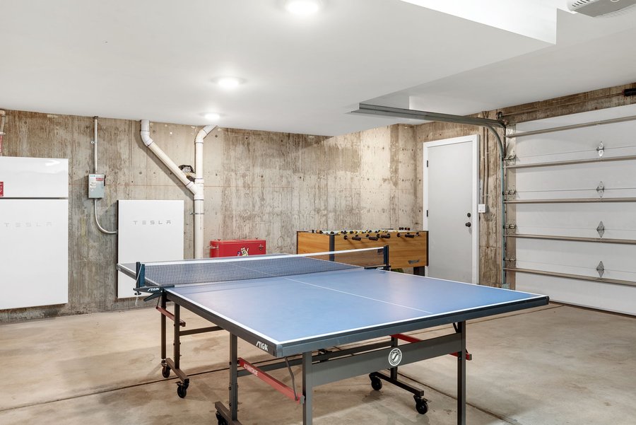 Game room with a ping pong table