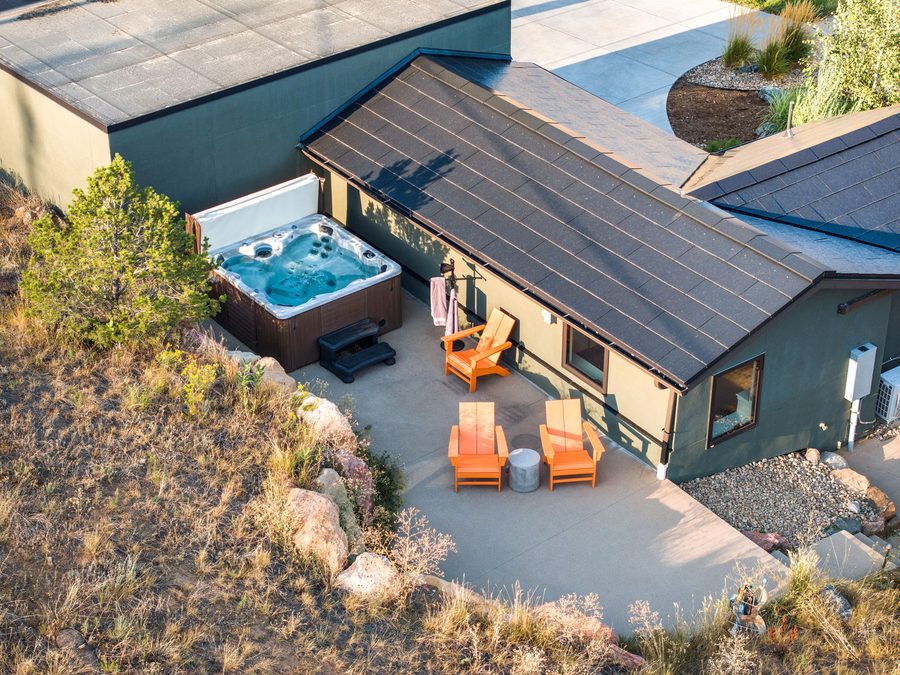 Guesthouse hot tub and orange chairs from above